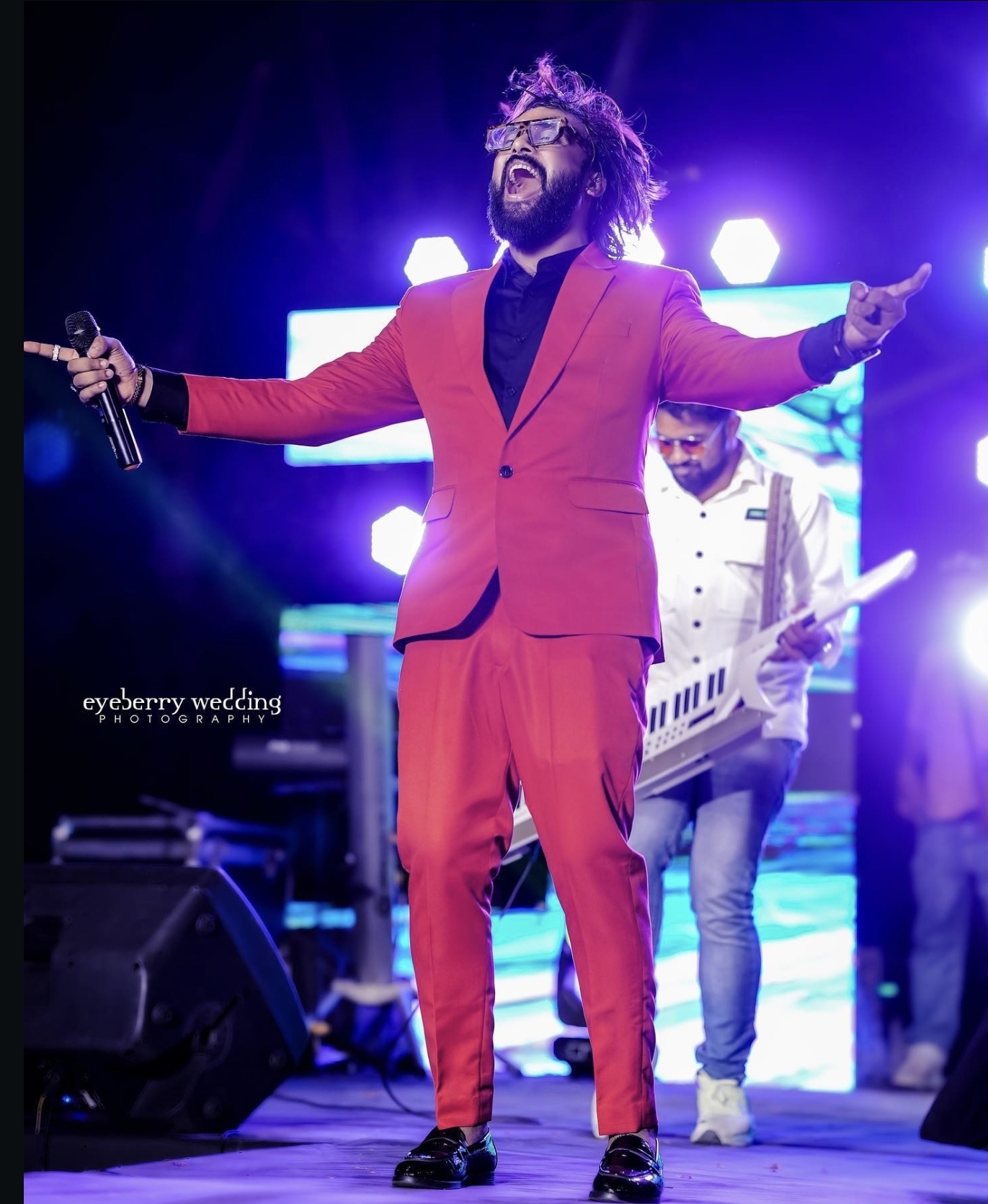 Shiya Majeed singing live on stage